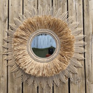 Miroir rond, combinant le bois naturel, le raphia, les cordes de lin....Ju0261